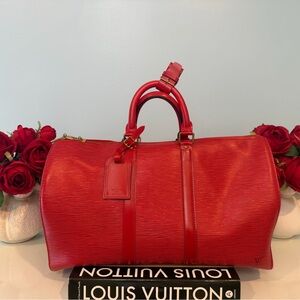 Louis Vuitton Keepall travel bag, Cherry Red Epi Leather